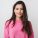 young and beautiful woman in pink warm sweater, natural look, smiling, portrait on white studio background, isolated, long hair